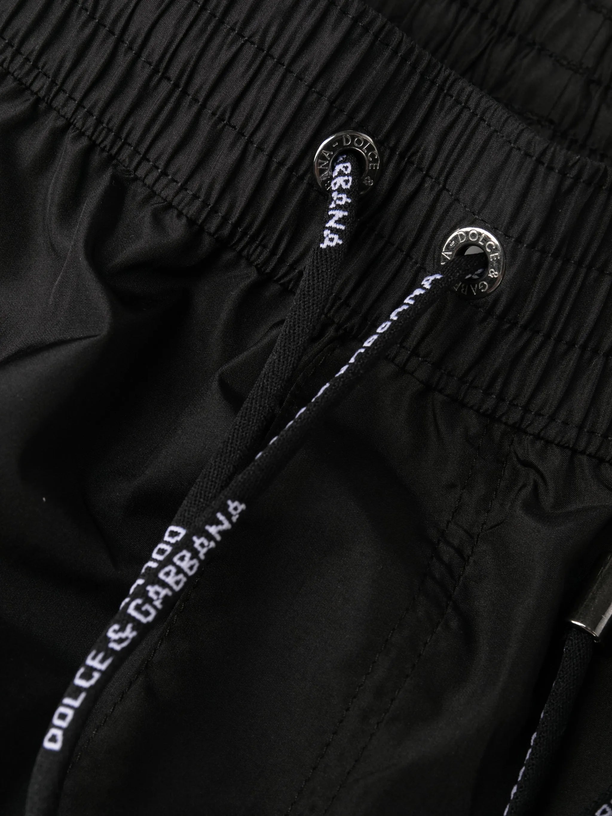 Swim shorts with logo badge