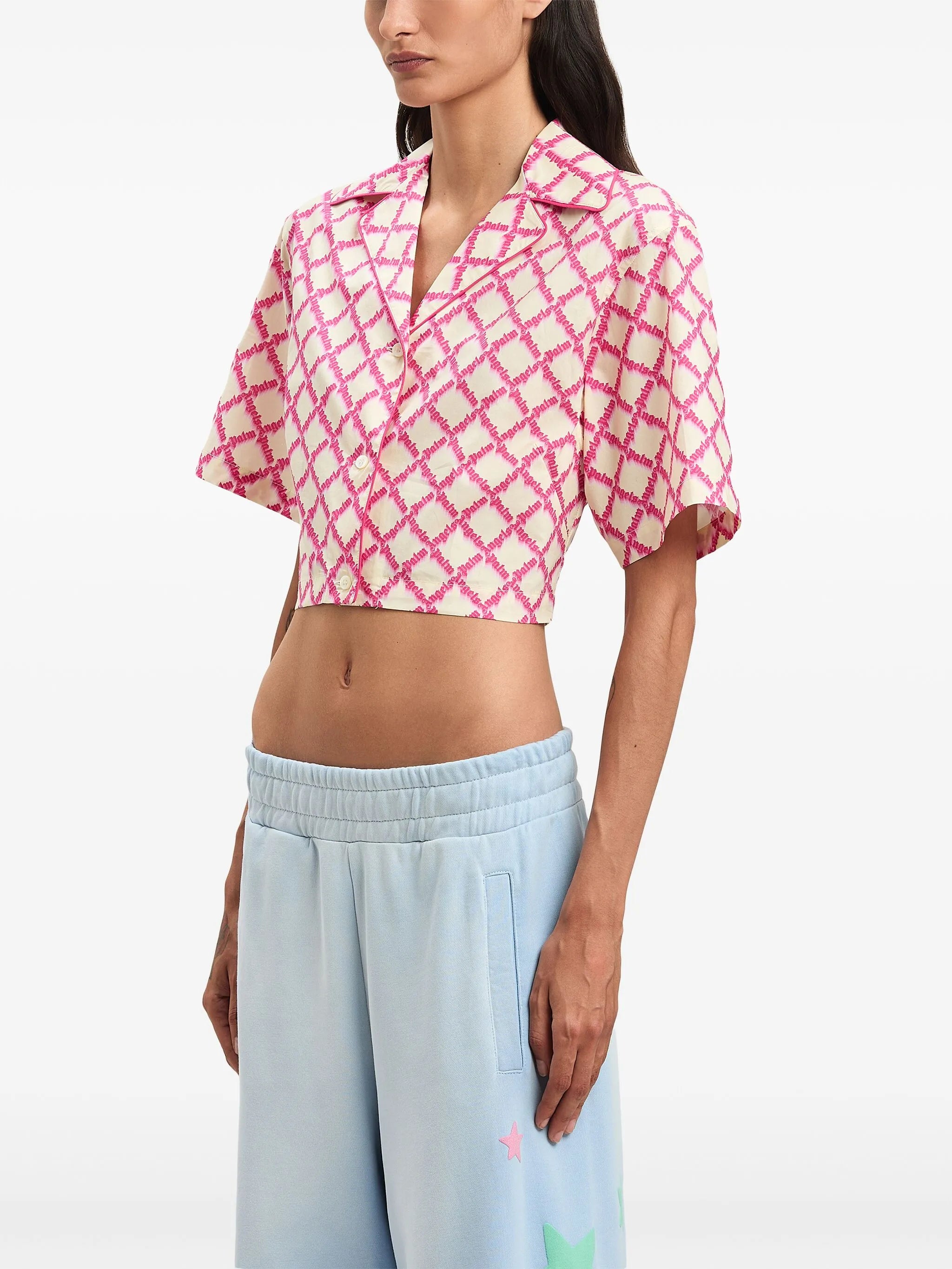 Košeľa s prekríženým logom