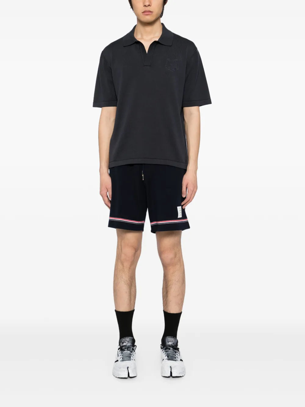 Knitted polo shirt with bold fox head embroidery