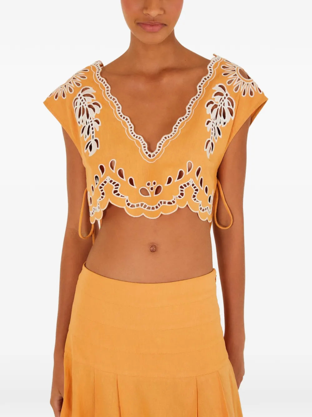 Top with eyelet embroidery pattern