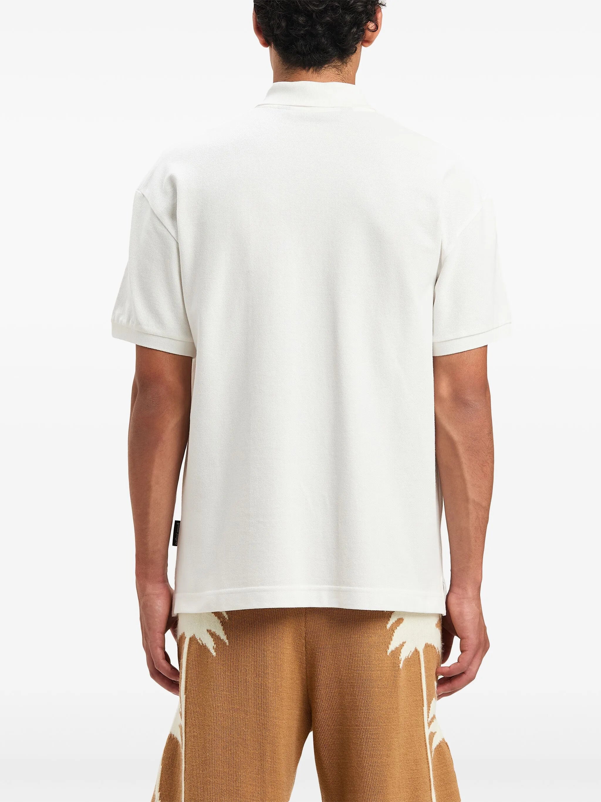 Polokošile s zakřiveným logem