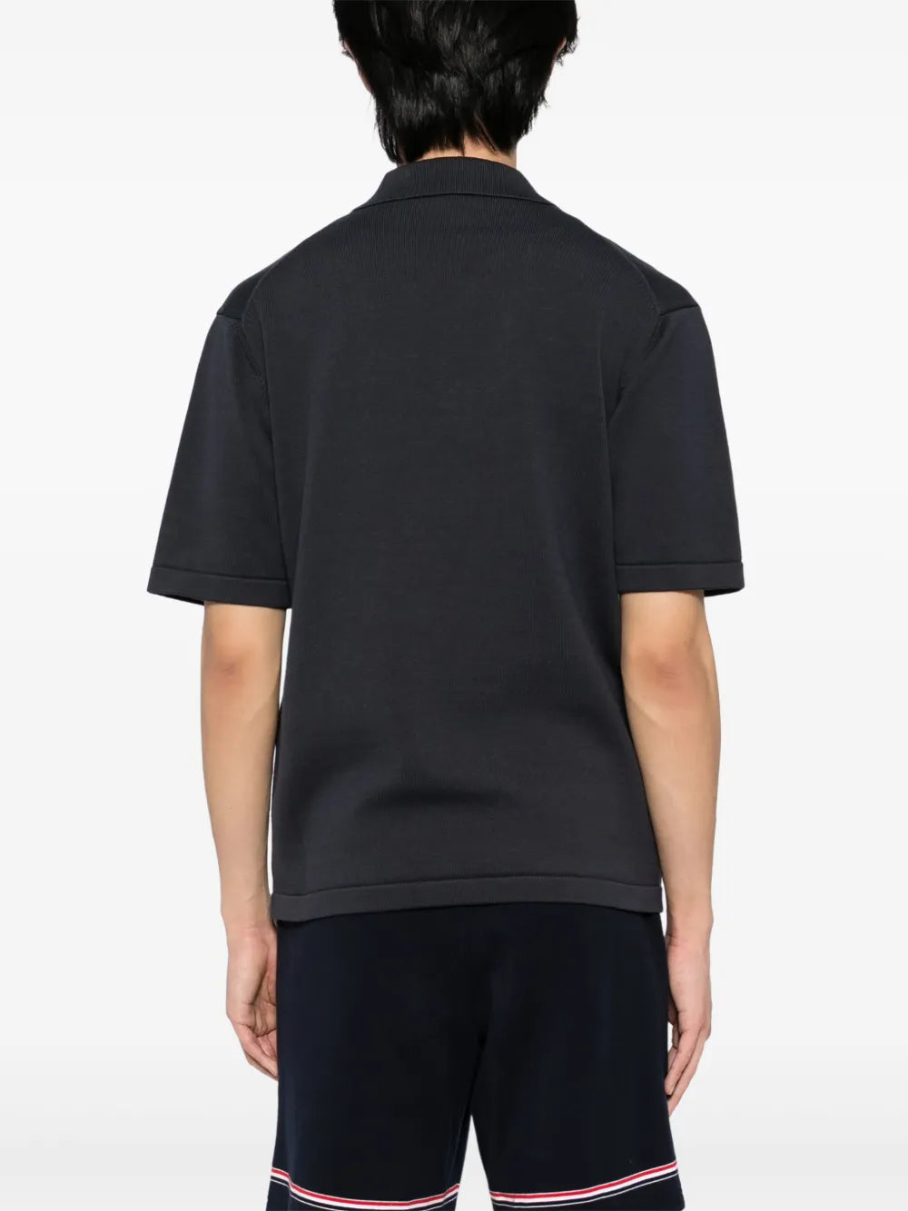 Knitted polo shirt with bold fox head embroidery