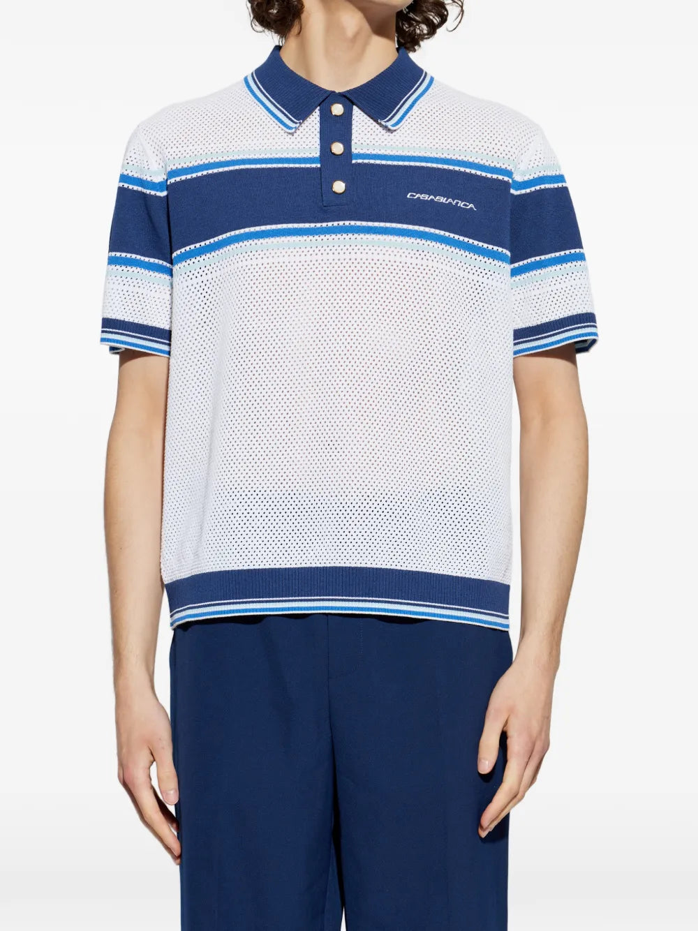 Polo shirt with eyelet pattern