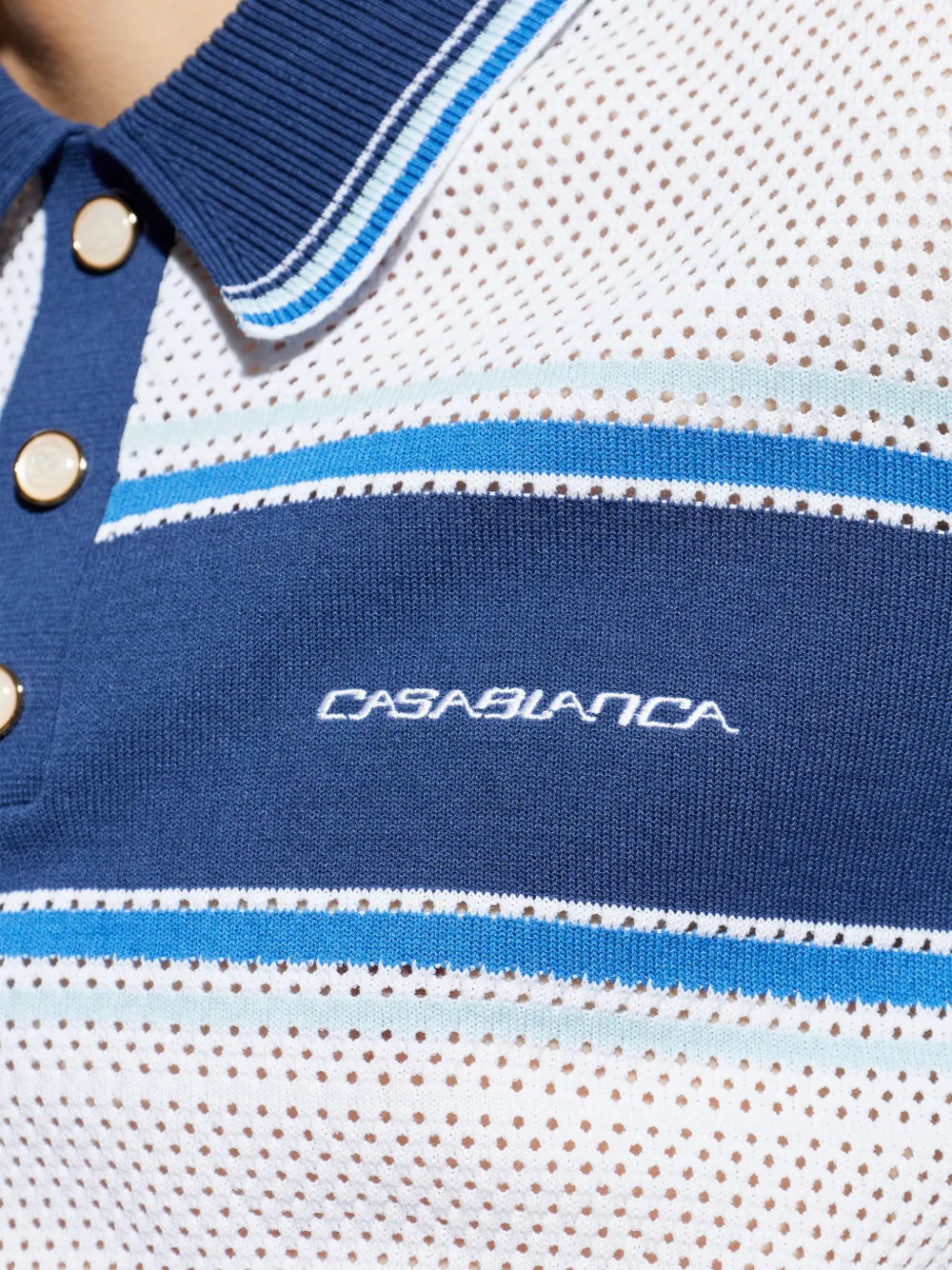 Polo shirt with eyelet pattern