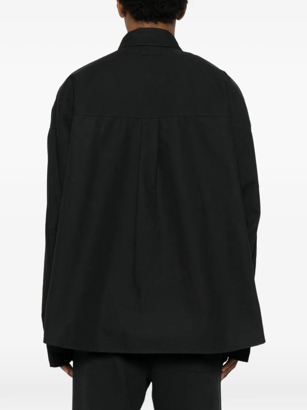 Shirt with snap button closure